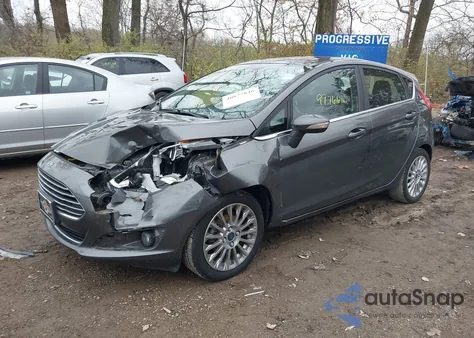 2016 Ford Fiesta Titanium z USA, uszkodzony, nr VIN 3FADP4FJXGM130417